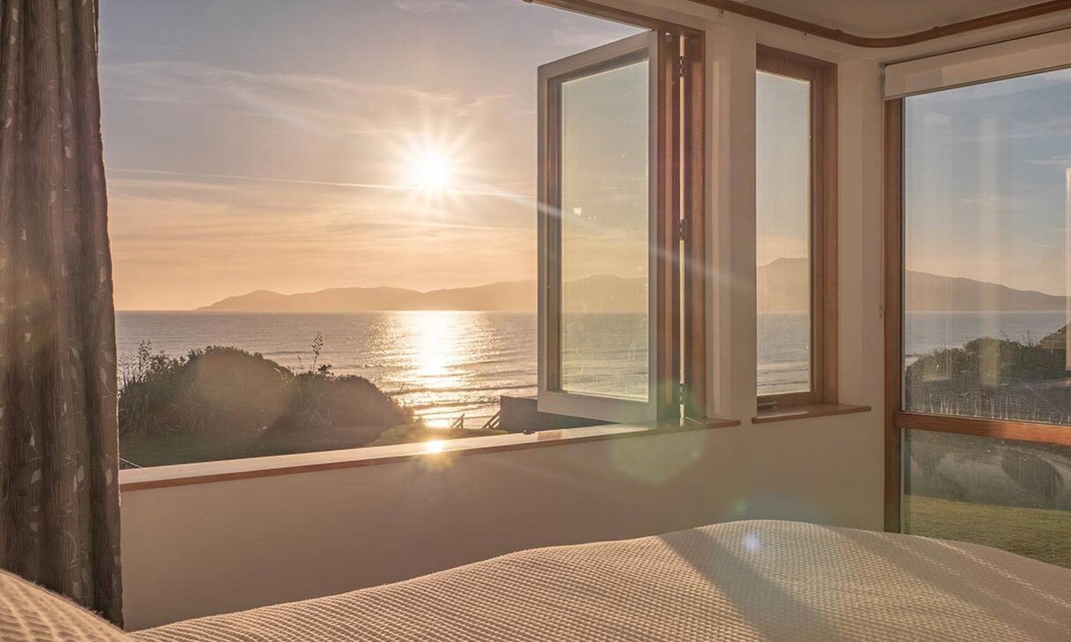 Raumati South House | Absolute beachfront home with stunning views in Raumati. Sleeps up to 18 people.