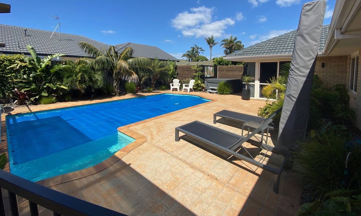 Papamoa Beach House | Beach house with pool and spa close to the beach in papamoa