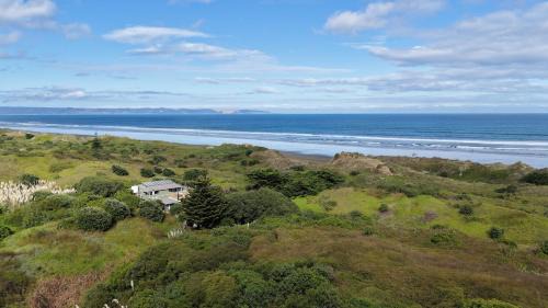 Far North District House | Ocean Dunes Retreat - Sauna & Spa