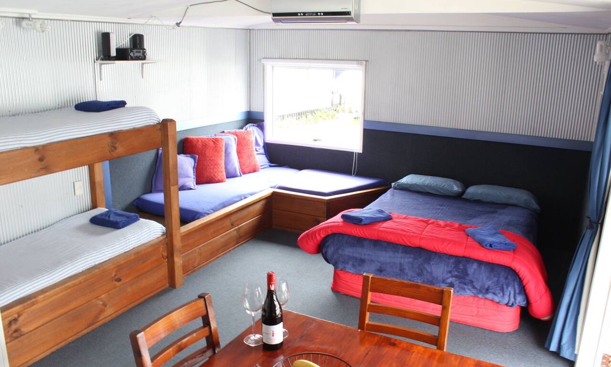 Okere Falls RV Rental | Self-Contained Cabin in a Prime Waterfront Location on Lake Rotoiti