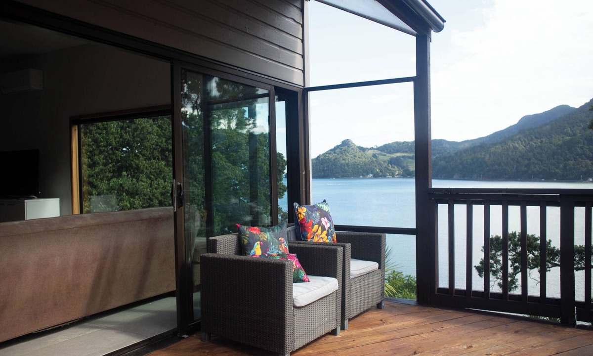 Huia House | Te Whare Huia - a stunning spacious home right on beautiful Huia Bay.