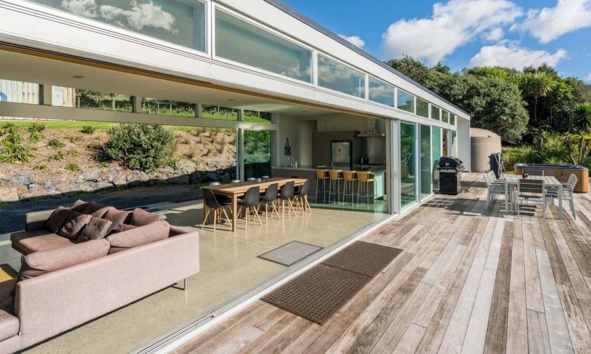 Mangawhai House | The Glass House - Modern, pet-friendly designer holiday home with spectacular views and spa pool