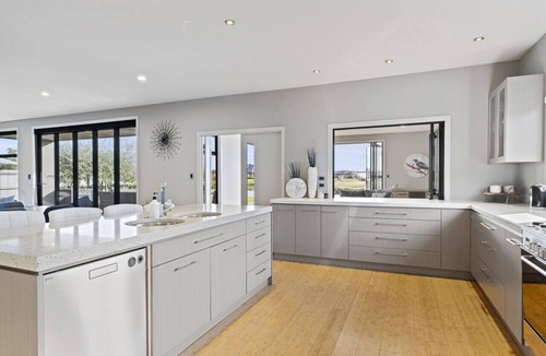 Huntingdon House | 6BR Relax at Lake Hood Luxury Canal Home with Jetty