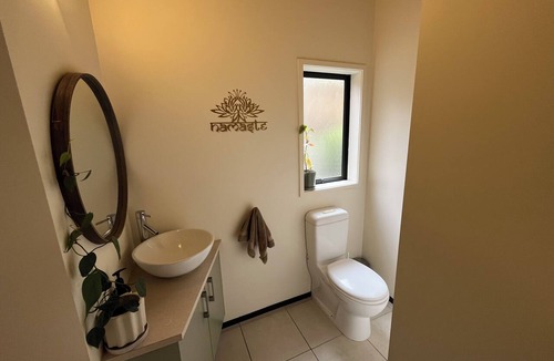 Matakatia House | A 3-bedroom Coastal Garden Retreat on the Hibiscus Coast with spa and sauna.
