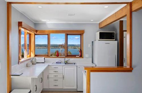Acacia Bay House | Acacia Bay Retreat - Charming 3BR Retreat With Fireplace and Views
