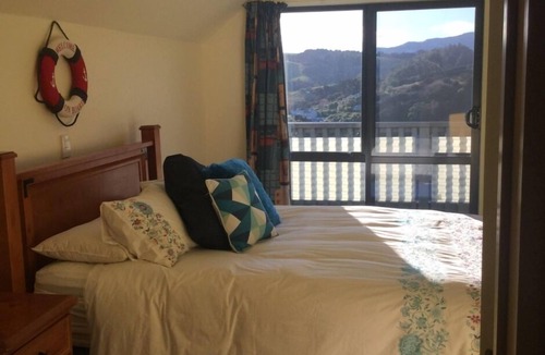 Akaroa House | Awesome House , Warm and Sunny Holiday Home , Large Parking area for 2 Boats.