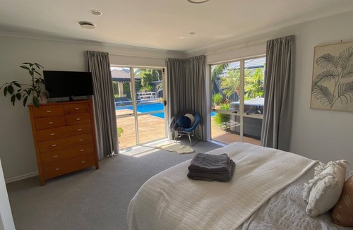 Papamoa Beach House | Beach house with pool and spa close to the beach in papamoa