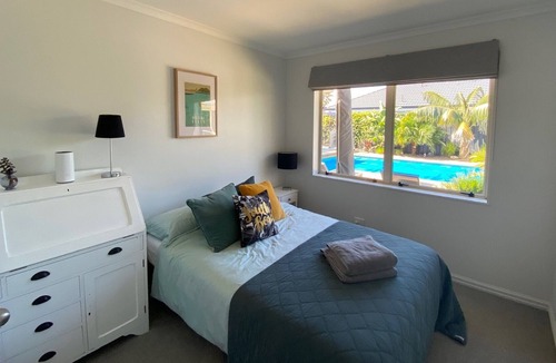 Papamoa Beach House | Beach house with pool and spa close to the beach in papamoa
