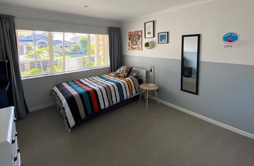 Papamoa Beach House | Beach house with pool and spa close to the beach in papamoa