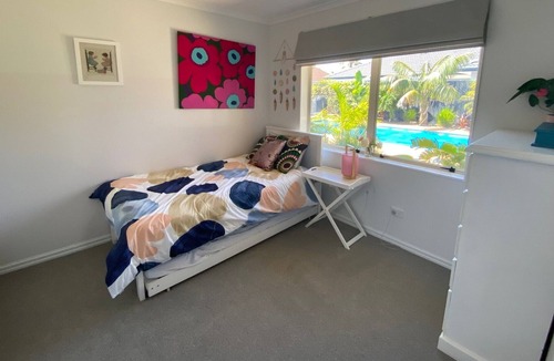 Papamoa Beach House | Beach house with pool and spa close to the beach in papamoa