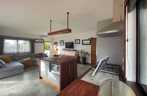 Waihi Beach Cottage | Beach Road Bach, handcrafted furnishings, 5 minute walk to the beach