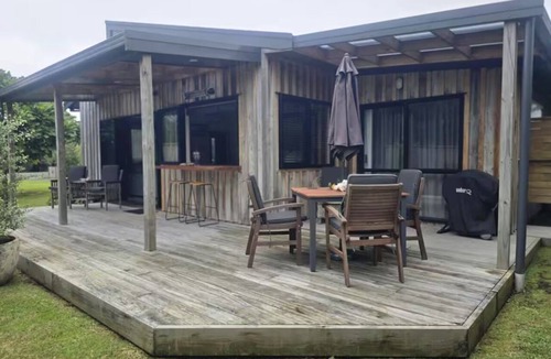 Waihi Beach Cottage | Beach Road Bach, handcrafted furnishings, 5 minute walk to the beach
