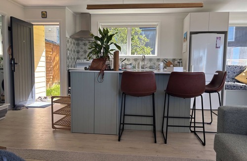 Papamoa Beach House | Beachfront- Laid back, quintessential Kiwi bach.