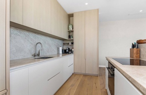 Langs Beach House | Black House Red Roof - Langs Beach Holiday Home