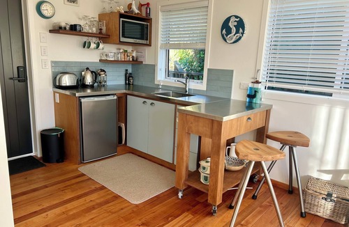 Little Akaloa Cabin | Cosy cabin style bach, immersed in native bush, in beautiful Banks Peninsula