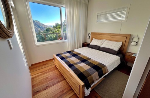 Little Akaloa Cabin | Cosy cabin style bach, immersed in native bush, in beautiful Banks Peninsula