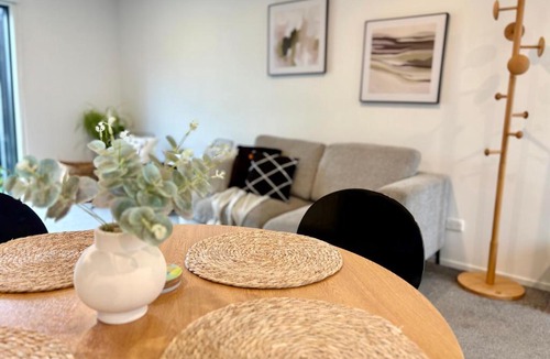 Addington Apartment | Cosy Townhouse Close to Wolfbook Arena One KM Away From Railway Station With Rare Onsite EV Car Park