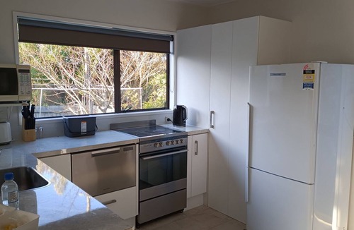 Purakaunui House | Family & pet-friendly beach bach, everything you need. 2 minutes to the beach!