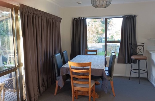 Purakaunui House | Family & pet-friendly beach bach, everything you need. 2 minutes to the beach!
