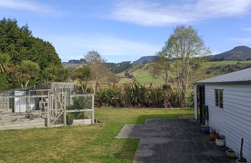 Purakaunui House | Family & pet-friendly beach bach, everything you need. 2 minutes to the beach!