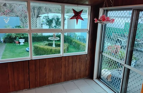 Whanganui House | Frances's Patch with a rural backdrop in whanganui