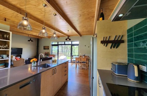 Hahei House | Hahei Hideout Retreat - private and surrounded by bush. Pond and small orchard