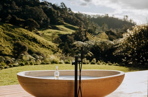 Whakamarama RV Rental | Jungle Den Experience the ultimate retreat in a luxury tent