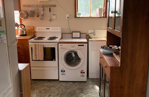 Waitarere Beach House | Kiwi Bach. Sea-glimpse, beach walk, we love the dogs :)
