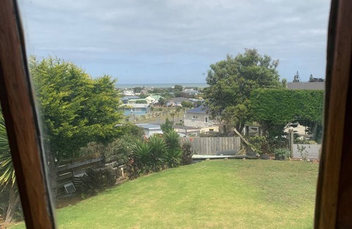 Waitarere Beach House | Kiwi Bach. Sea-glimpse, beach walk, we love the dogs :)
