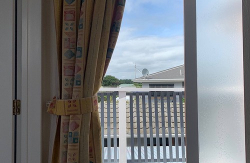 Waitarere Beach House | Kiwi Bach. Sea-glimpse, beach walk, we love the dogs :)