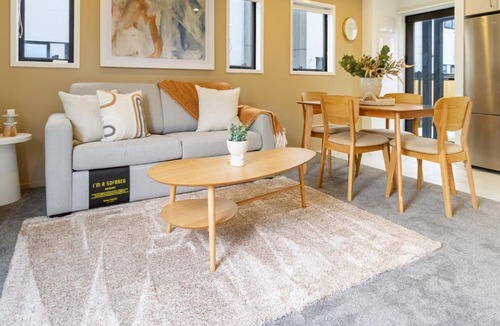 New Brighton Apartment | New Brighton Beach Explore - King Bed and sofa bed