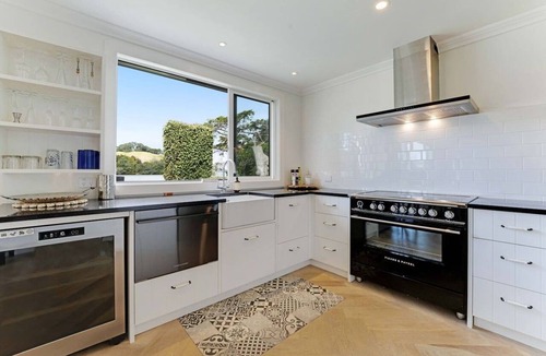 Whangateau House | Panoramic Ocean Escape with Deck, BBQ & Sea Views