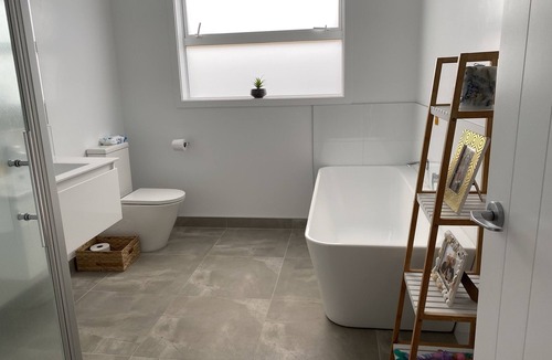 Papamoa Beach House | Papamoa Paradise - relax in the hot tub