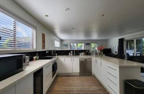 Hahei House | Pet friendly, big lawn and covered outdoor space to play, centrally located