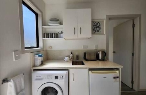 Hahei House | Pet friendly, big lawn and covered outdoor space to play, centrally located
