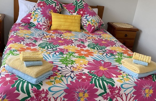 Papamoa Beach House | Play on the beach. Enjoy special short or long term rental rates. Just ask us.