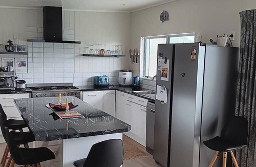 Pataua House | Relax, Coastal and Warm-Top Deck Beach House