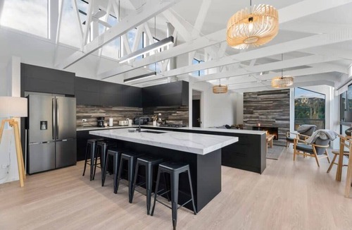 Arthur's Point House | Riverfront Chateau with Stunning Mountain Views