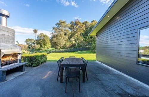 Rangatira Park House | Riverside in gated community, with spa pool and WI-FI