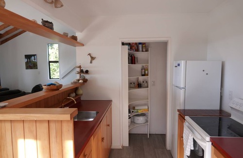 Tairua Cottage | Tairua Tree House - a traditional bach overlooking the Tairua Harbour