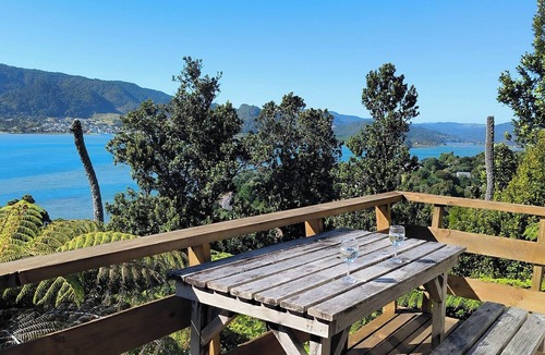 Tairua Cottage | Tairua Tree House - a traditional bach overlooking the Tairua Harbour
