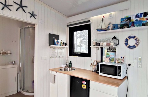 Midhirst House | Taranaki Creekside HOIHO by Tiny Away