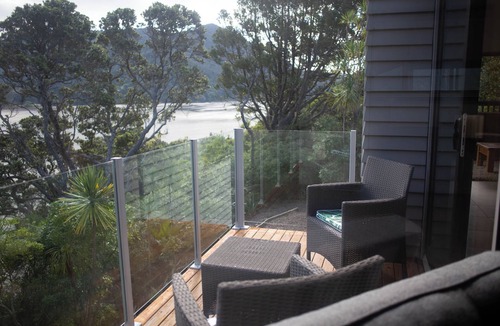 Huia House | Te Whare Huia - a stunning spacious home right on beautiful Huia Bay.