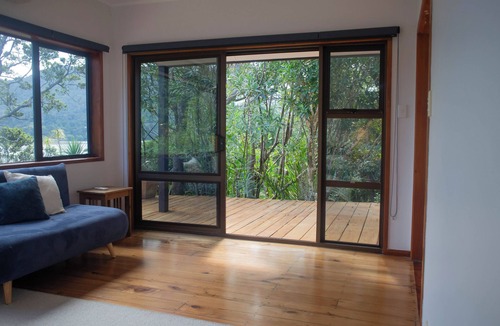 Huia House | Te Whare Huia - a stunning spacious home right on beautiful Huia Bay.