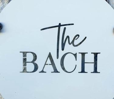 Pohara House | The Bach Nestled across the road from Pohara Beach