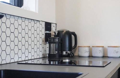 Kawaha Point House | The Bluebird - Lake Views, Stylish, Sleeps 4
