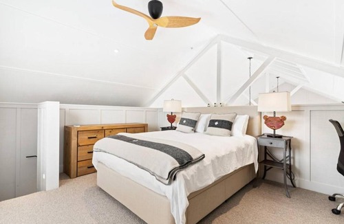 Tawharanui House | The Boat House - Rustic Luxury in Matakana