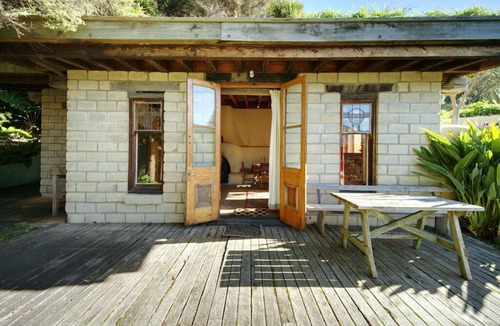 Pigeon Bay Apartment | The Mud House— earth studio in Pigeon Bay with views, wood-fired sauna & bath!