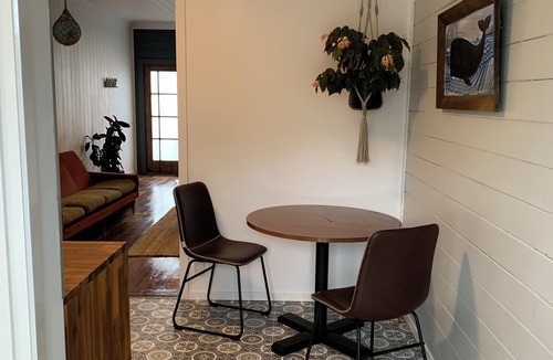 Opunake House | The Old Siren. An old shop by sea, for walkers, surfers, and slow mornings.