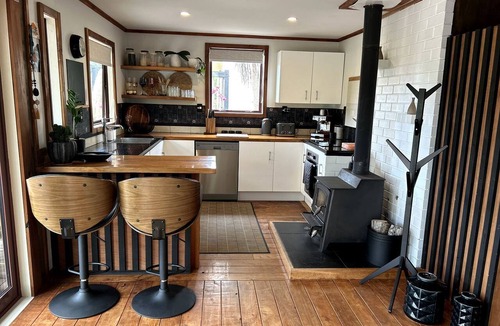 Little Wanganui Cabin | Tranquil Glamping Oasis: Luxurious Cabin on the Coast in Karamea, New Zealand